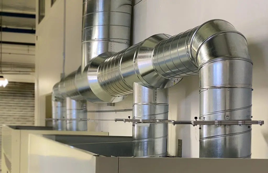Clean spiral galvanized HVAC ductwork installation on a Bay Area commercial project