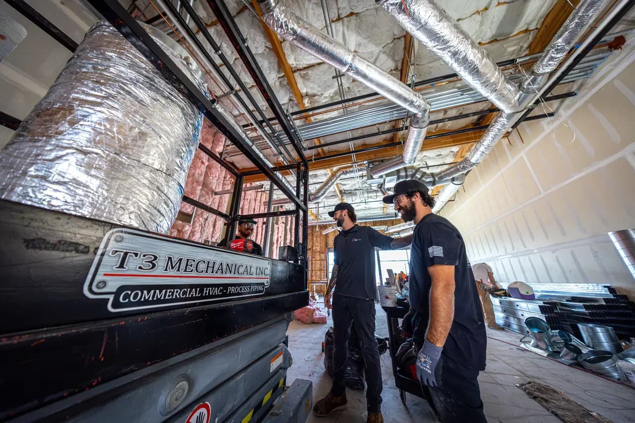 T3 Mechanical field technicians on a commercial HVAC install in the SF Bay Area