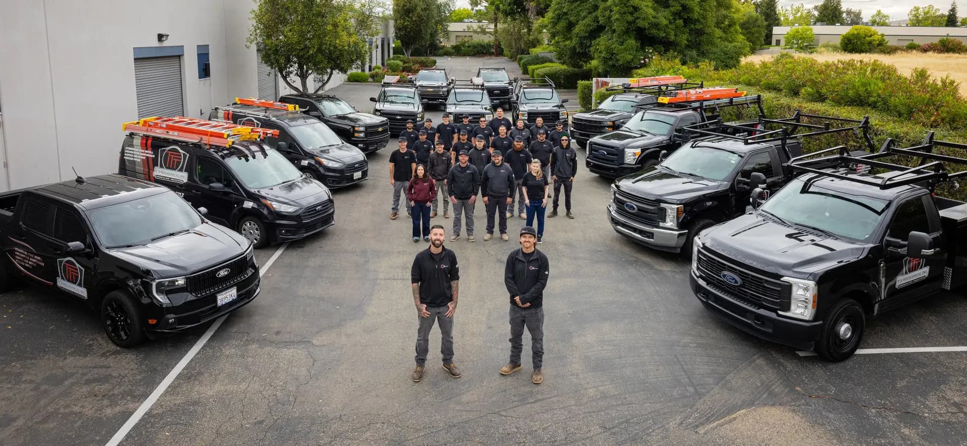 The T3 Mechanical team standing in front of the company fleet at the Livermore, California headquarters